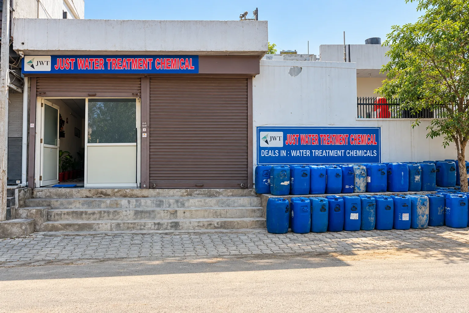 AI-recreated view of the Just Water Treatment Chemical storefront with its business sign and blue chemical cans outside